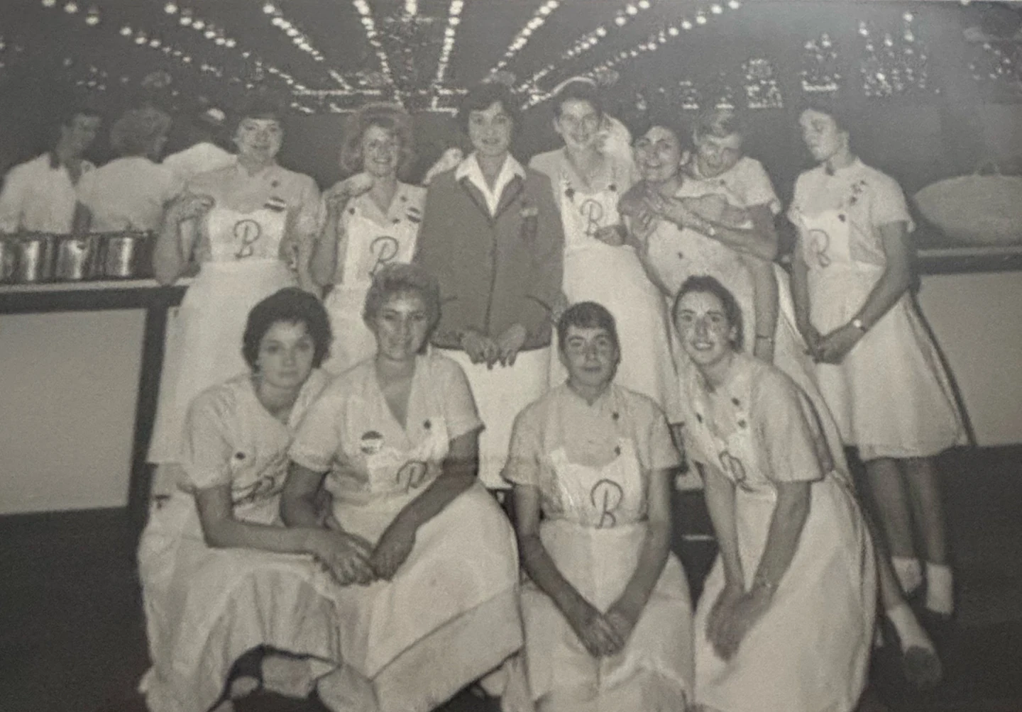 Elizabeth and Rosemarie (front) with other servers
