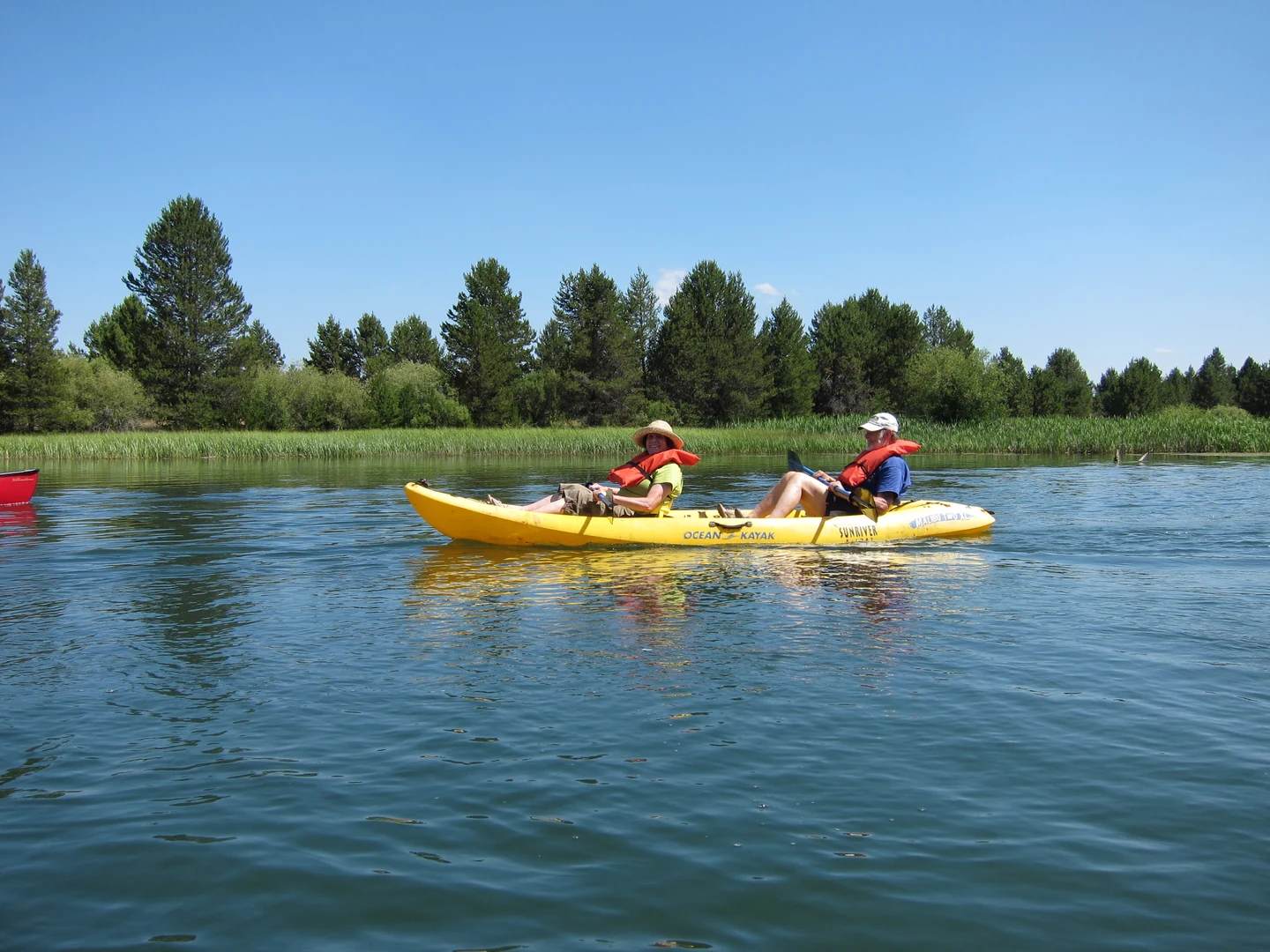 Elizabeth and Mike kayaking on the Deschutes River