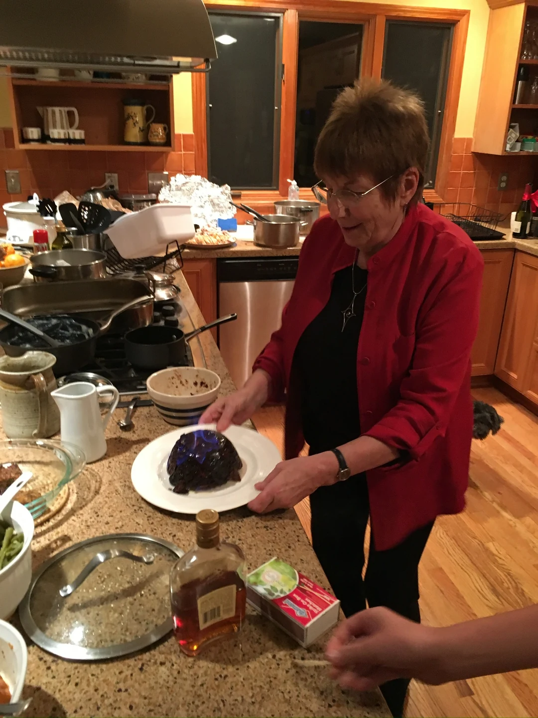 Elizabeth with the flaming Christmas pudding in Beaverton